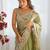 Green embellished sequinned organza saree