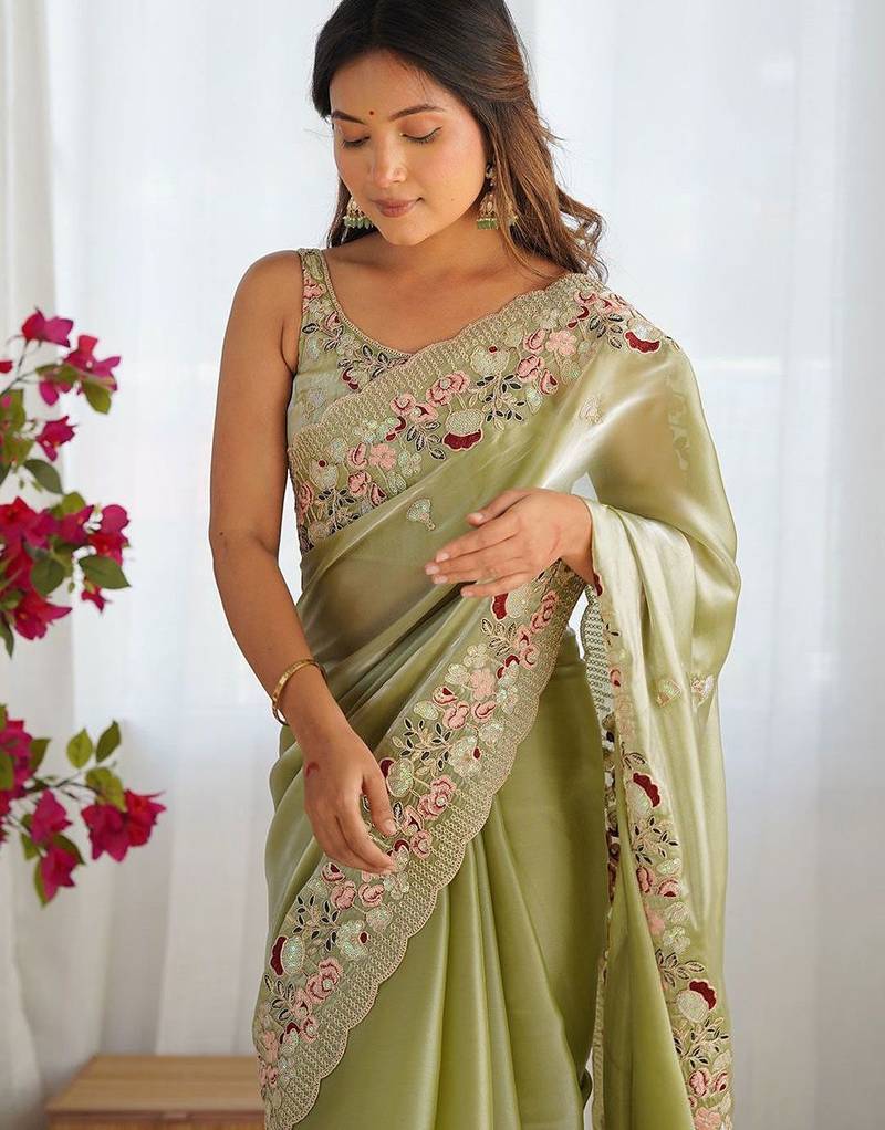 Green embellished sequinned organza saree