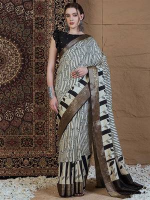 Off white floral zari silk blend sungudi saree 1
