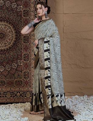 Off white floral zari silk blend sungudi saree 3