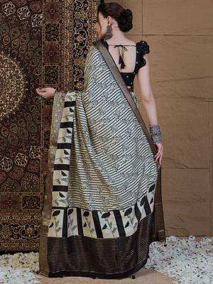 Off white floral zari silk blend sungudi saree 4