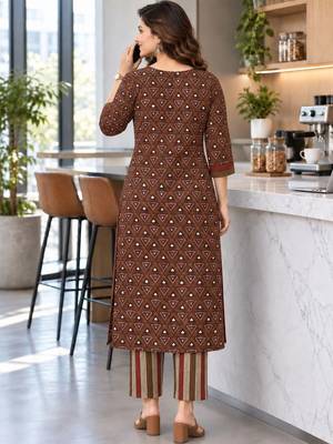 women printed regular  cotton kurta with trousers & with dupatta 4