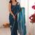 Teal embellished mirror work tissue heavy work saree