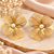 Anti-tarnish filigree petal design, statement studs, women's jewellery, lightweight metal, festive wear