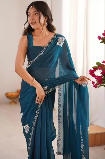 Teal embellished mirror work tissue heavy work saree