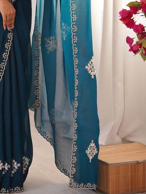 Teal embellished mirror work tissue heavy work saree 5