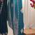 Teal embellished mirror work tissue heavy work saree