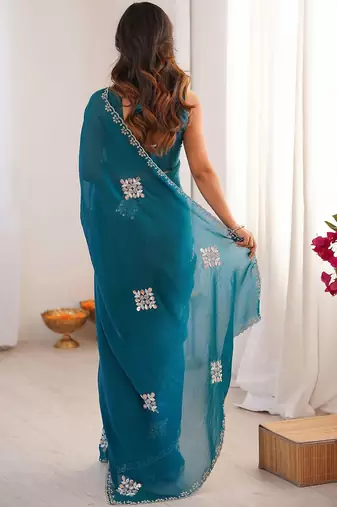 Teal embellished mirror work tissue heavy work saree