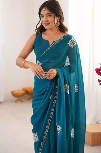 Teal embellished mirror work tissue heavy work saree