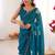Teal embellished mirror work tissue heavy work saree