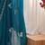 Teal embellished mirror work tissue heavy work saree