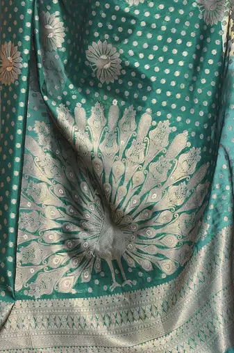 Turquoise woven design organza banarasi saree