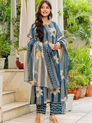 women floral printed regular  cotton kurta with trousers & with dupatta 1