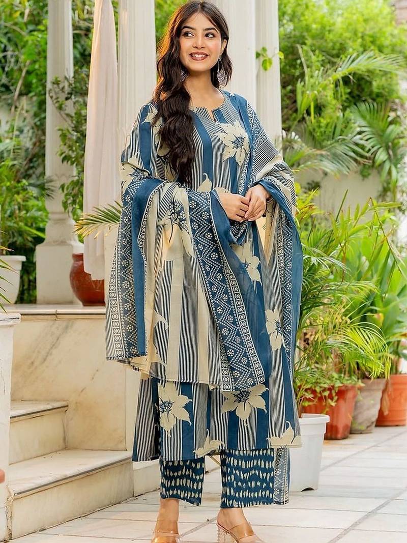 women floral printed regular  cotton kurta with trousers & with dupatta