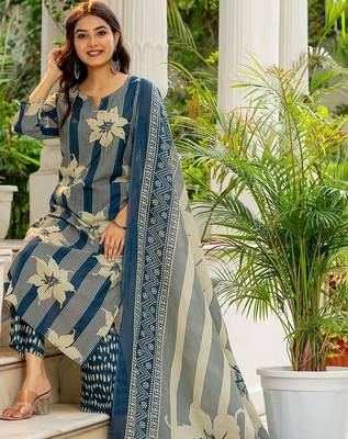 women floral printed regular  cotton kurta with trousers & with dupatta 4