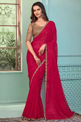 Pink embellished embroidered poly georgette saree