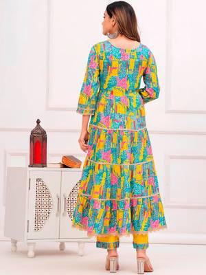 women ethnic motifs printed tiered thread work kurta with trousers & with dupatta 2