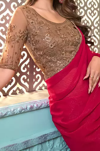 Pink embellished embroidered poly georgette saree