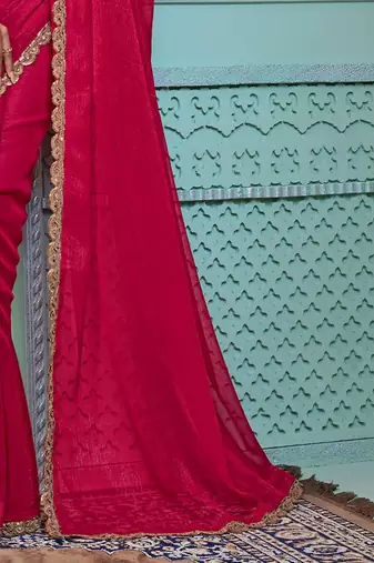Pink embellished embroidered poly georgette saree