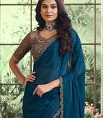 Teal embellished embroidered poly georgette saree