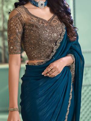 Teal embellished embroidered poly georgette saree 4