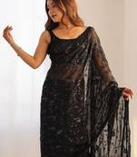 Black embellished sequinned  georgette saree