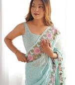 Turquoise embroidered sequinned  georgette saree
