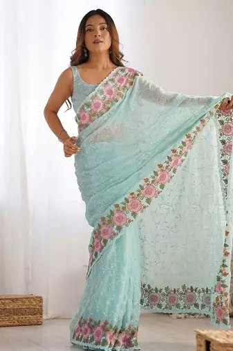 Turquoise embroidered sequinned  georgette saree