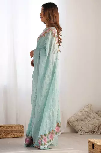 Turquoise embroidered sequinned  georgette saree