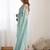Turquoise embroidered sequinned  georgette saree