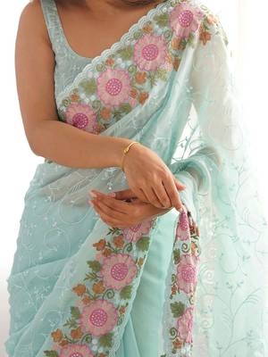 Turquoise embroidered sequinned  georgette saree 4