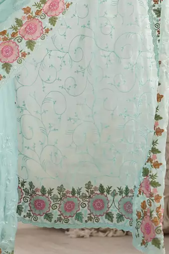 Turquoise embroidered sequinned  georgette saree