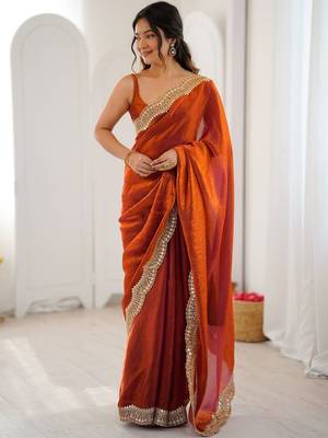 Orange embellished sequinned satin heavy work saree 1