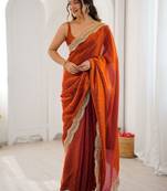 Orange embellished sequinned satin heavy work saree