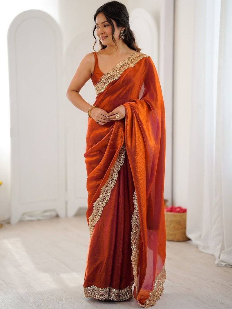 Orange embellished sequinned satin heavy work saree