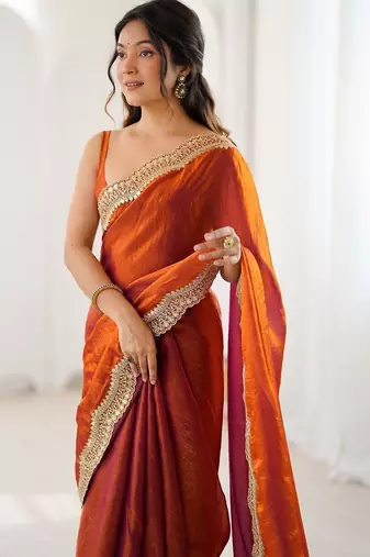 Orange embellished sequinned satin heavy work saree