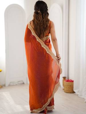 Orange embellished sequinned satin heavy work saree 3