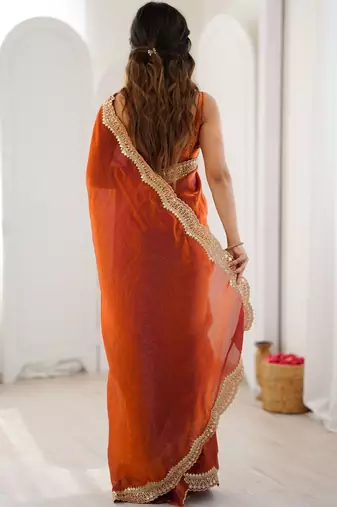 Orange embellished sequinned satin heavy work saree