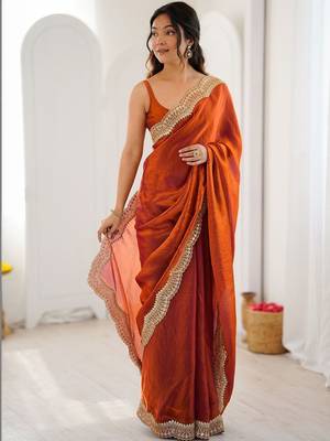 Orange embellished sequinned satin heavy work saree 4