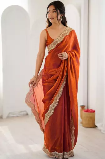 Orange embellished sequinned satin heavy work saree