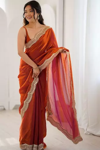 Orange embellished sequinned satin heavy work saree