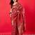 Red bandhani woven design zari border saree