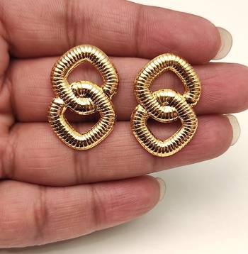 Anti-tarnish, ribbed texture, statement studs, bold knot design, women's jewellery 4