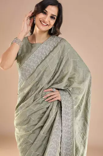 Sea green floral embroidered beads and stones saree