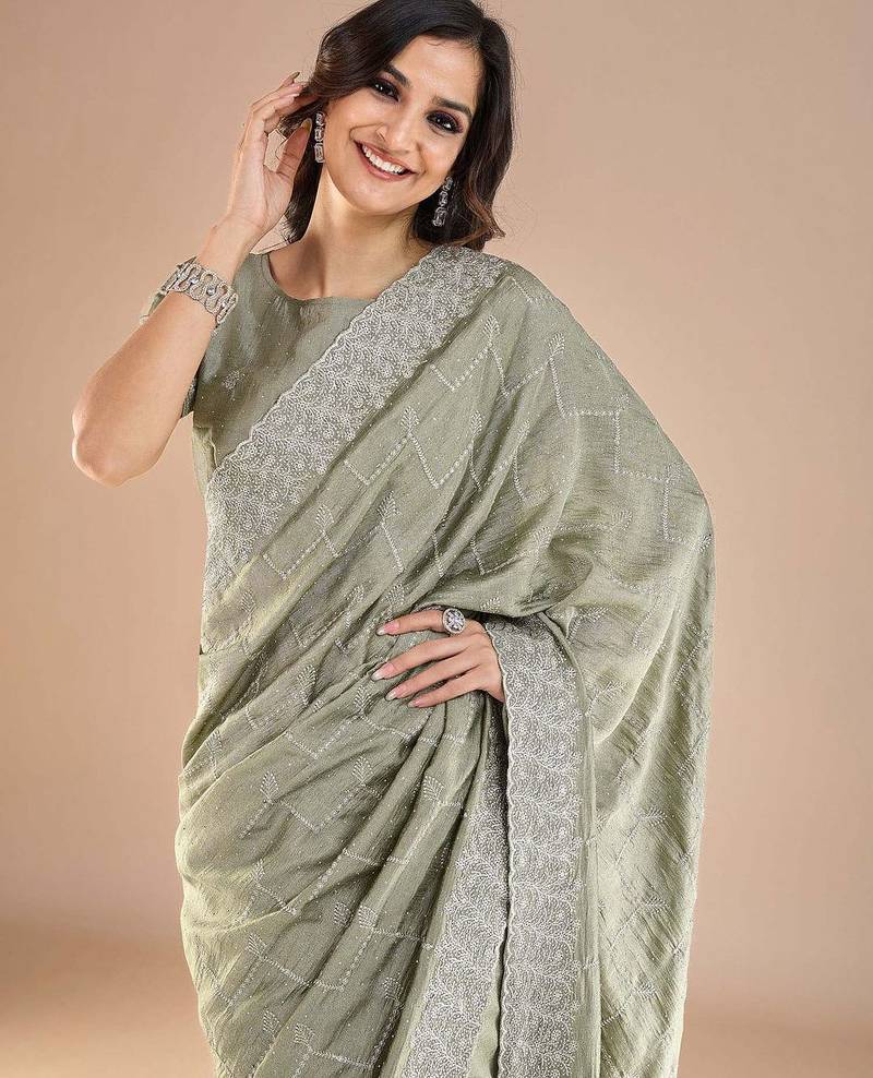 Sea green floral embroidered beads and stones saree