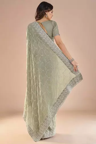 Sea green floral embroidered beads and stones saree