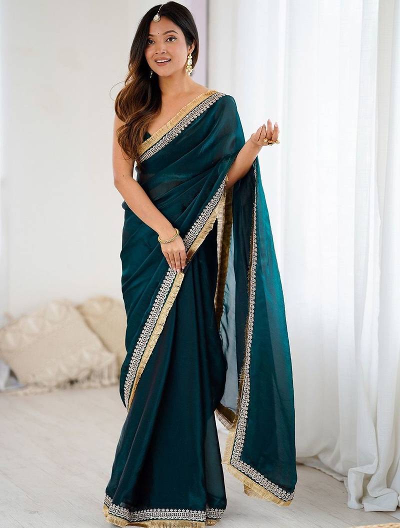 Teal embellished zari satin heavy work saree