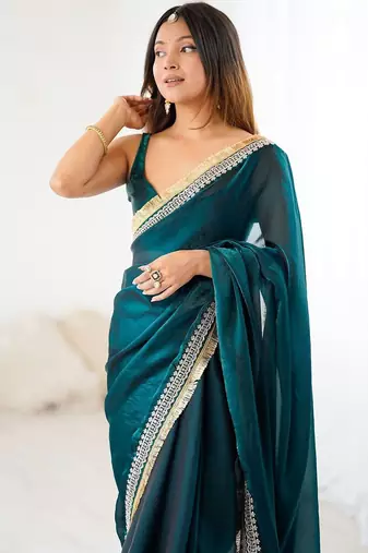 Teal embellished zari satin heavy work saree