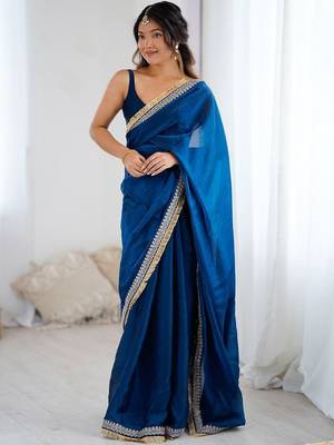 Blue ethnic motifs embroidered satin saree 1