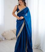 Blue ethnic motifs embroidered satin saree